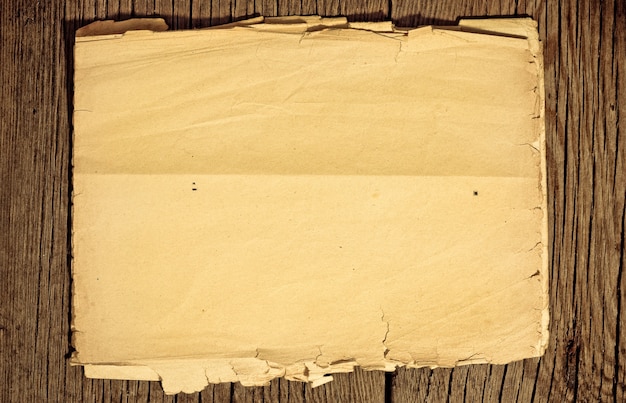 Papel velho em textura de madeira