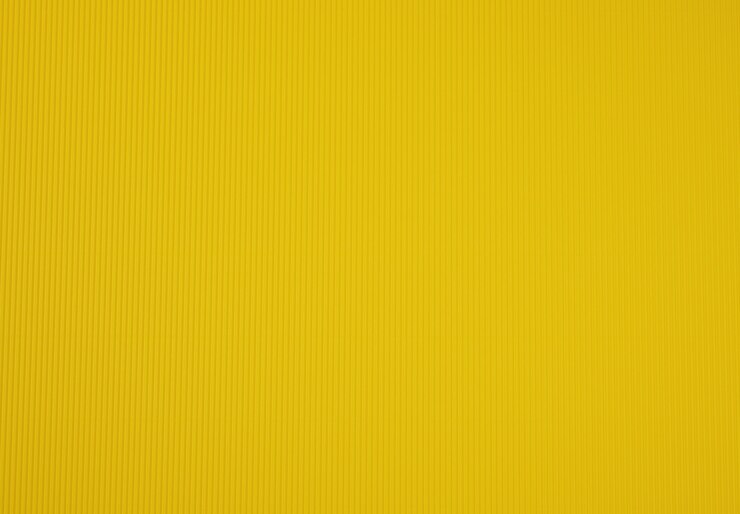 Foto papelão ondulado cor amarela, fundo abstrato para designer