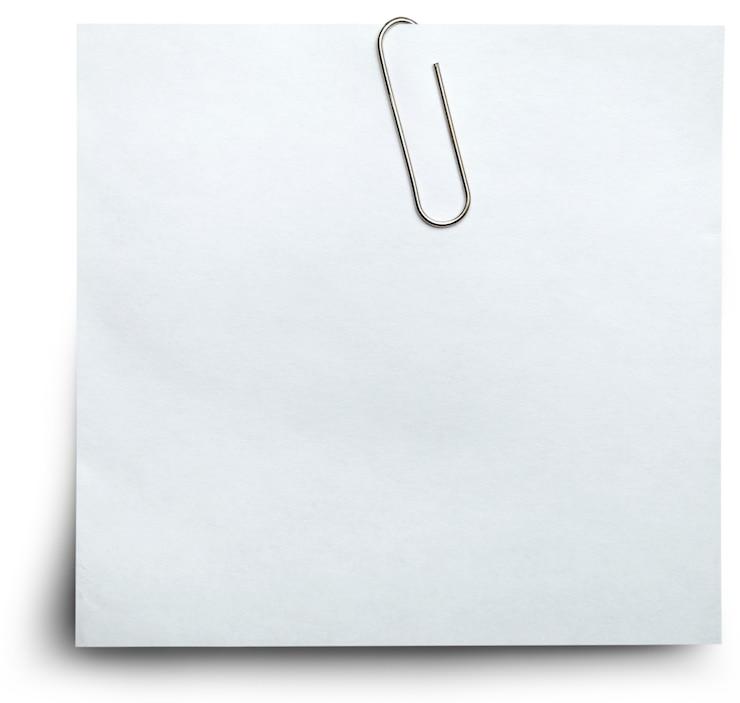 Foto papier mit büroklammer gehalten