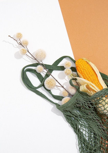 Paquete de compras de comida gratis Bolsa natural ecológica con maíz orgánico y flores decorativas