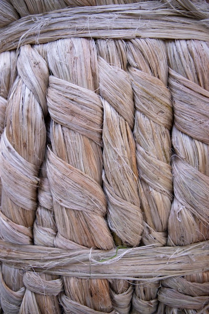 Paquete dorado grueso de textura de patrón de fibra de yute crudo se puede utilizar como papel tapiz de fondo
