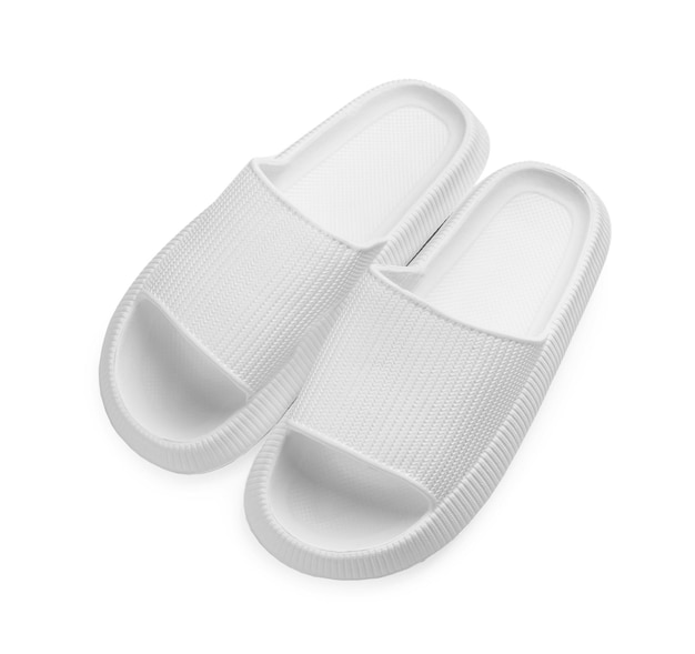 Par de zapatillas de goma aislado en blanco