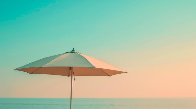 Foto un paraguas de playa minimalista contra un cielo con gradiente generado por la ia