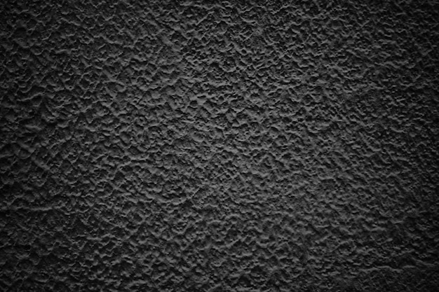 Pared abstracta negra, textura de cemento oscuro como fondo