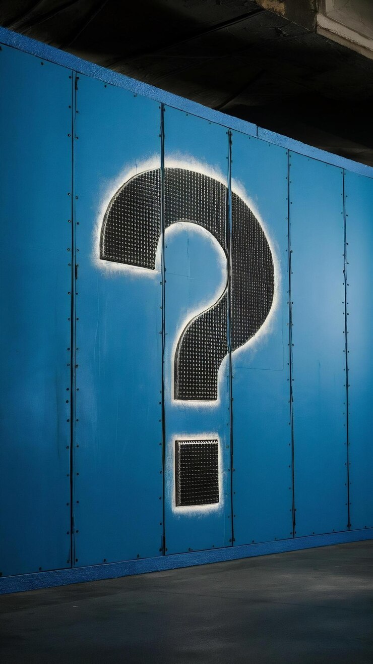 Foto una pared azul con un signo de interrogación en ella