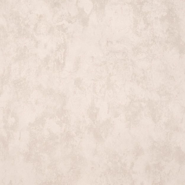 Una pared beige con un fondo de textura blanca.