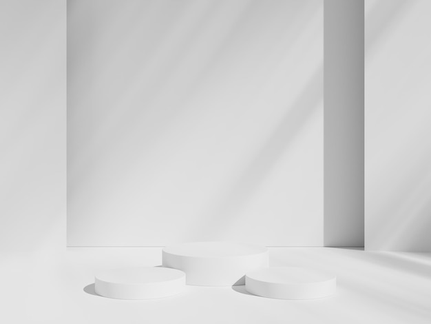 Una pared blanca con una pared blanca y tres podios blancos.