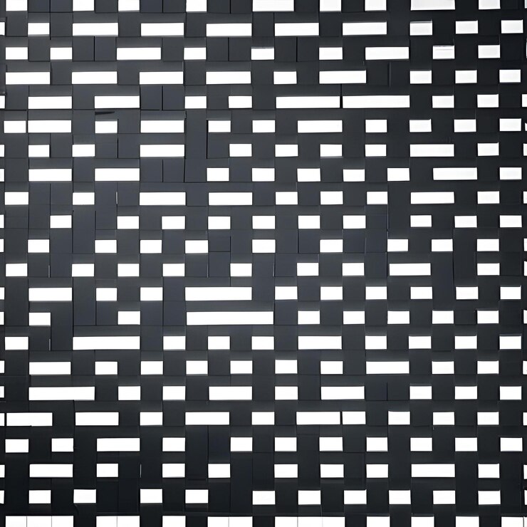 Foto una pared en blanco y negro con una cuadrícula de cuadrados en el medio.