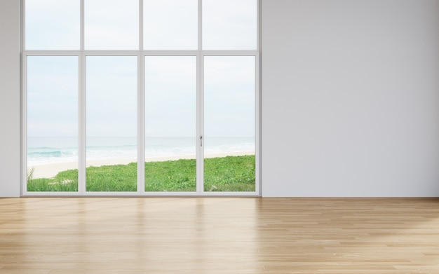 Pared en blanco en el piso de madera vacío del gran salón en casa moderna con vista a la playa y al mar