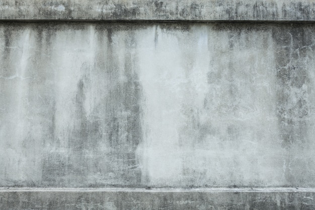 Pared concreta vieja de la textura con el grunge para el fondo abstracto.