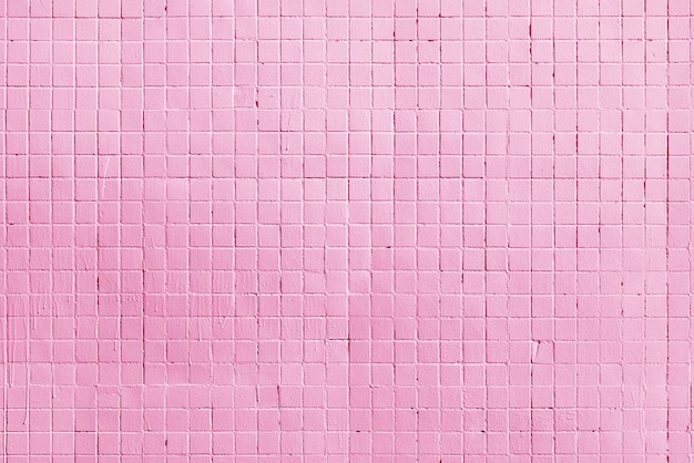 Pared del edificio de ladrillo rosa. Fondo