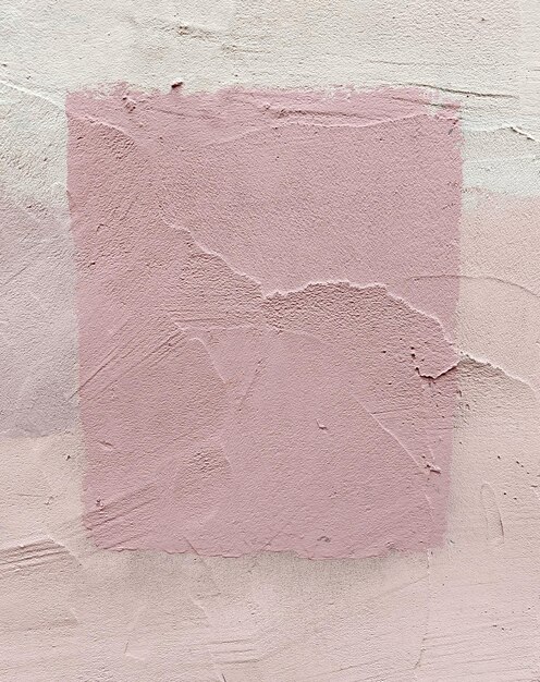 Foto pared enlucida de color rosa con rastros de pintura de fondo hermoso de color rosa