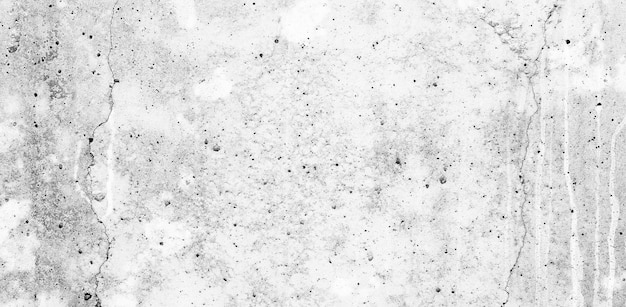 La pared gris y blanca se puede utilizar como fondo. Textura de cemento blanco en mal estado