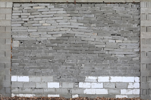 pared gris de bloques de ladrillo