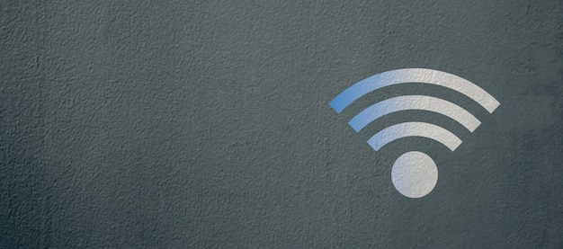 Foto una pared gris con un cartel de wifi