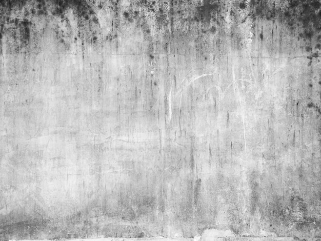 Pared gris con una mancha de pintura blanca