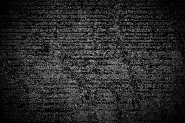 Pared grunge hormigón negro con fondo claro