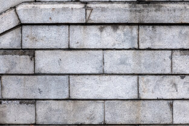 Pared de ladrillo gris para textura y fondo