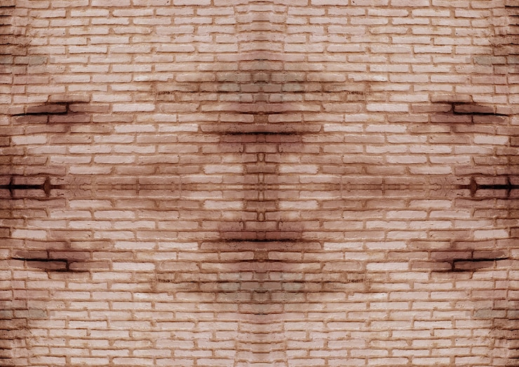 Foto una pared de ladrillo marrón