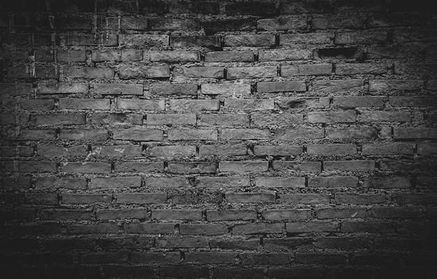 Pared de ladrillo negro con textura de sombra se puede utilizar como fondo