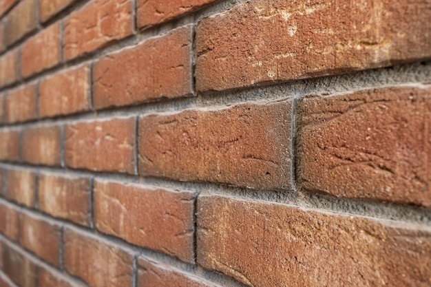 Pared de ladrillo en perspectiva con ladrillos de colores