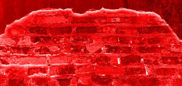 Una pared de ladrillo rojo con un fondo rojo que dice 'rojo'