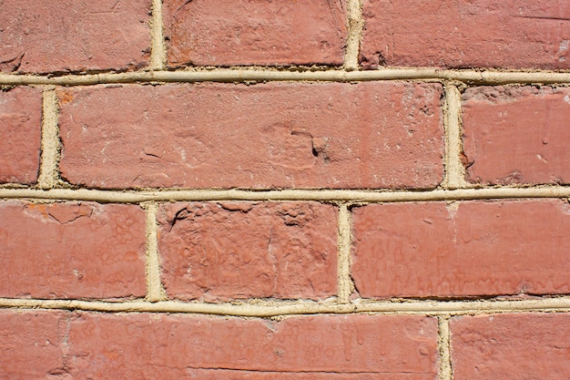 Pared de ladrillo rojo vintagePared de ladrillo dilapidadaantecedentestexturaEdificio de ladrillo antiguo desvanecido