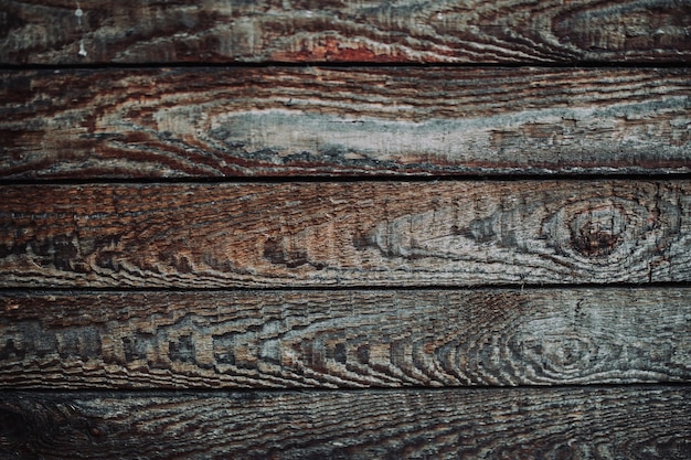 Una pared de madera con un patrón de madera.