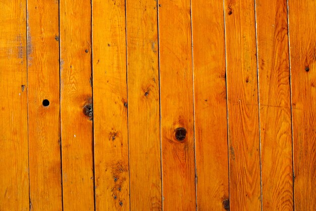 Pared de madera vieja con listones verticales. claridad en todo el marco. Foto de alta calidad