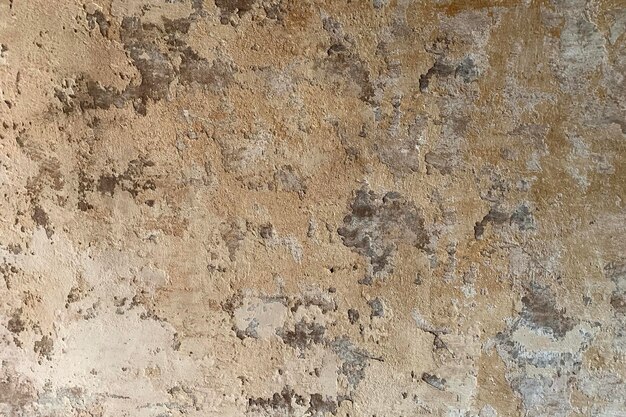 Pared de oro de patrón moderno de textura con pintura desgastada