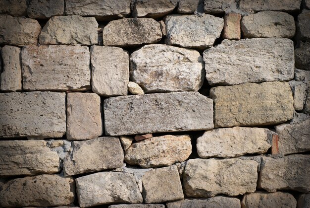 La pared de piedra de ladrillo se puede utilizar para el fondo