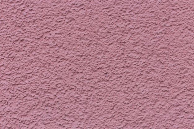 Pared pintada de color rosa. Textura o fondo