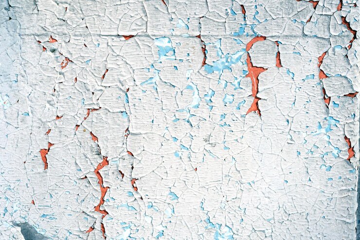Pared de pintura vieja descascarada agrietada