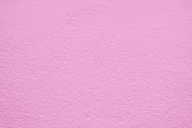 Pared de textura de estuco rosa del edificio