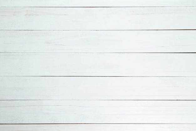 Pared de textura de madera blanca, vista superior de la mesa de madera