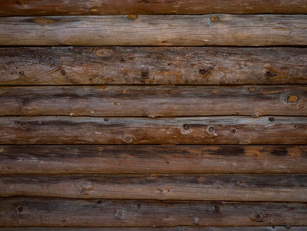 Foto pared de troncos textura de madera marrón