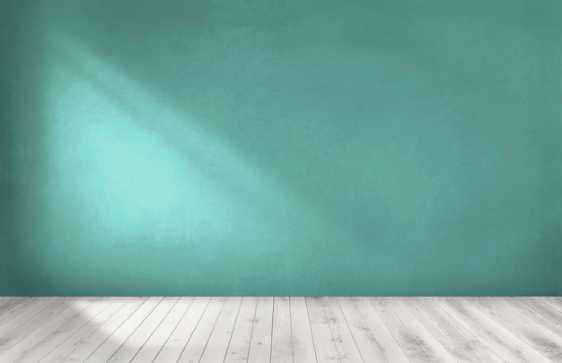 Pared verde en una habitación vacía con un piso de madera