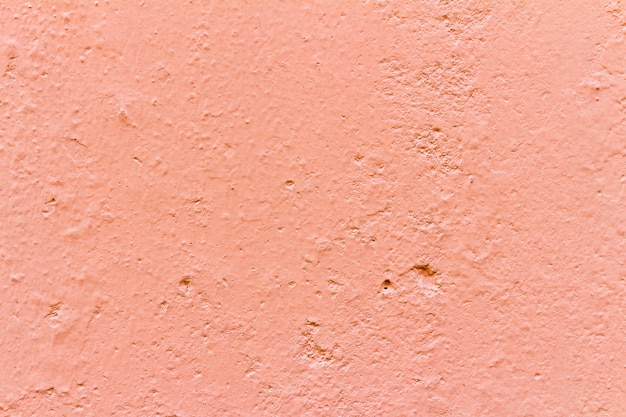 Parede cor-de-rosa e laranja textura de fundo