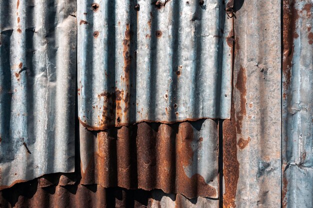 Foto parede de chapa de zinco velha e enferrujada chapa de metal de estilo vintage padrão de textura de telhado de chapa metálica velha