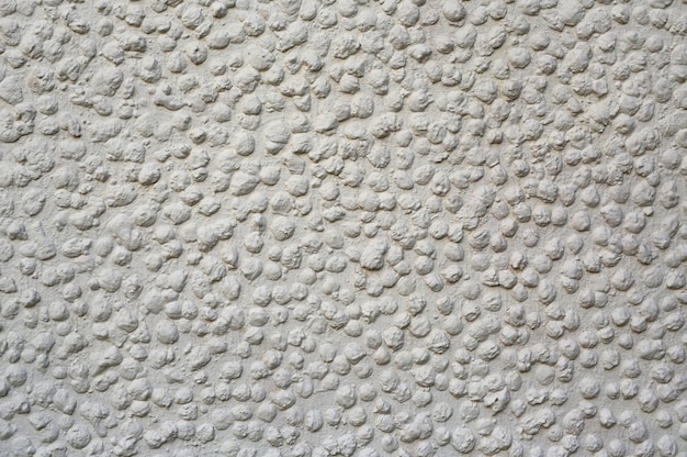 parede de cimento com pedra de seixo