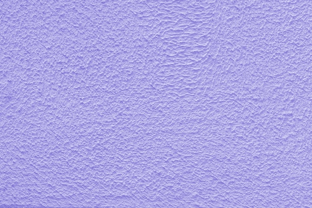 Parede de gesso violeta de um edifício textura de superfície áspera