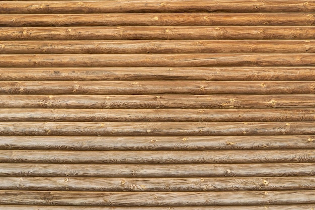 Parede de madeira de toras de pinheiro como textura de fundo