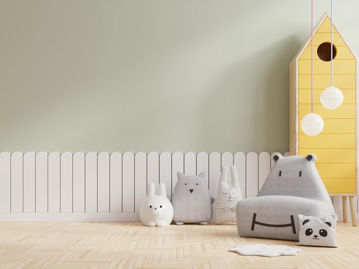 Foto parede de maquete no quarto das crianças com sofá cinza na parede de cor verde clara