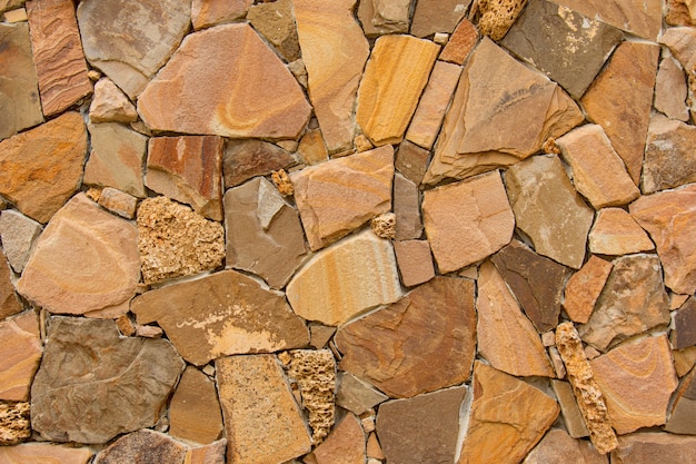 Foto parede de pedra moderna decorativa de pedra lascada para segundo plano