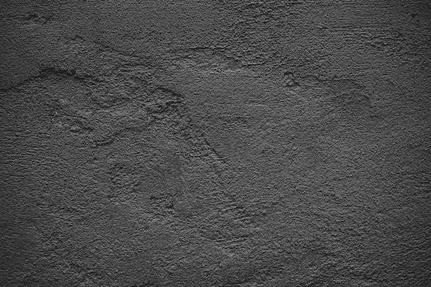 Parede de textura de concreto de cimento escuro.