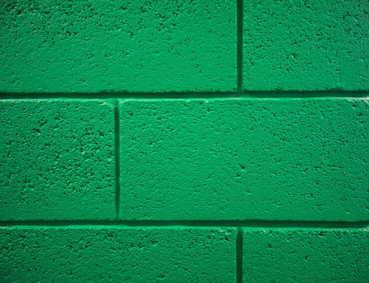 Foto parede de tijolo verde