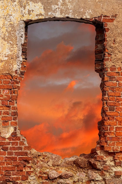 Foto parede de tijolos com uma corrida ao pôr do sol. foto de alta qualidade