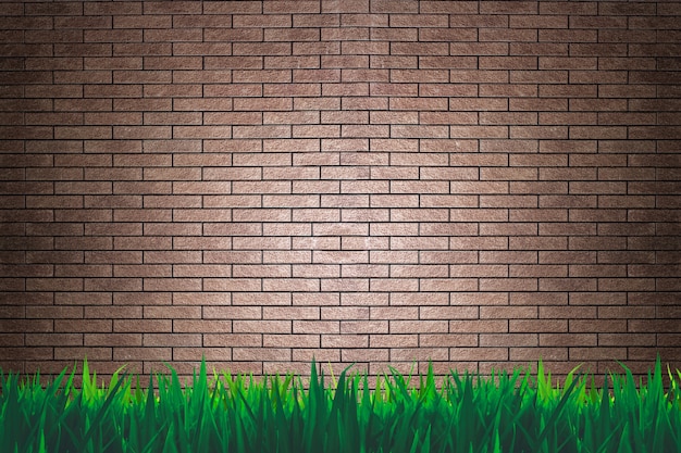 Foto parede de tijolos e grama de fundo ou papel de parede