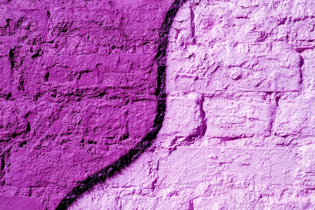 Parede de tijolos pintada de rosa