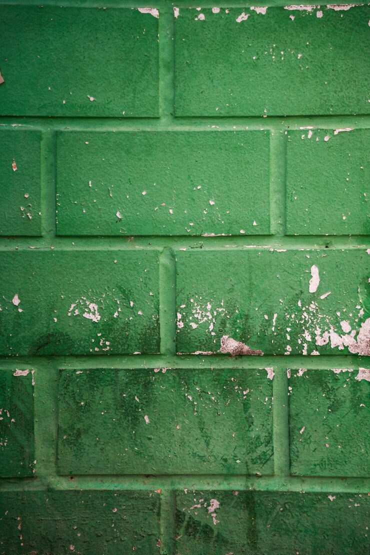Foto parede de tijolos rachada quebrada verde mar